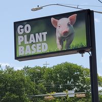 Sign outside! at COMMUNITY Kitchen + Taproom in Austin