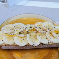 Peanut butter and banana toast at Biomio Brunch Ecológico in Sevilla