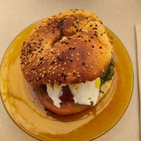 Mozzarella bagel with tomato and pesto at Biomio Brunch Ecológico in Sevilla
