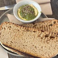 Hummus with pesto and sourdough  at Cafe On The Green in Widecombe In The Moor