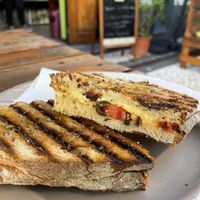 Vegan Sandwich with vegan cheese, tomatoes, oregano and olives also sweet options available  at Pimpinelas Coffe Shop Vegetariano in Santa Cruz Madeira