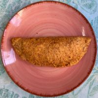 Vegan whole grain empanada with black beans and seitan. at Pimpinelas Coffe Shop Vegetariano in Santa Cruz Madeira