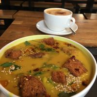 Coconut soup and Milchkaffee with Hafermilch at Sattgrün - Flingern in Dusseldorf