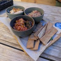 White bean dip and 2 types of eggplant dips with rye crackers at La Placinte - Ла Плэчинте in Chisinau