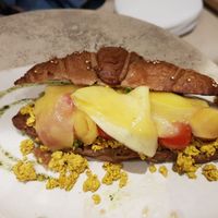 Vegan croissant with tofu and pickled fruit at La Papa in Barcelona