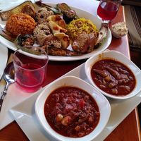 Homemade hibiscus lemonade and vegan mixed plate at Tsnim in Kamnik