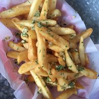 Garlic fries  at Downbeat Diner and Lounge in Honolulu