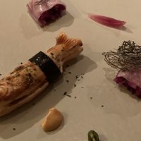 red cabbage rolls and a fish made from rice with potato filling  at Vegan French Restaurant L'Espéranceレスペランス in Sapporo