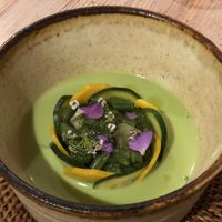 1st course: Pea soup with courgette slices, wild fern and edible flowers  at Vegan French Restaurant L'Espéranceレスペランス in Sapporo
