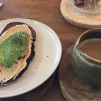 Cashew nut cheese toast and latte at Sama Sama Veggie in Salou