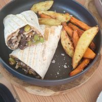 Vegan burrito with homemade fries at Sama Sama Veggie in Salou