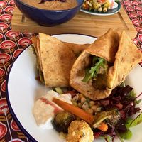 Rotiroll en pinda soep   at Little World Kitchen in Utrecht