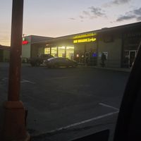 Parking lot and storefront at Himalayan Grill in Flagstaff