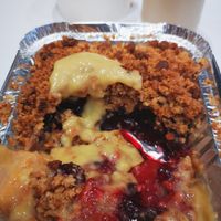 Cherry and apple crumble with custard and ice cream at Crumble Mania  - New Cross in South East London