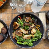 Bowl fresh vegetables with portions of vegan meatballs, whole rice and beans at Eat in Porto Alegre