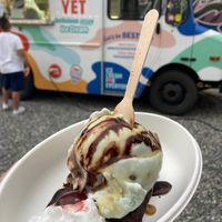 Mint chip on a brownie with a cherry on whipped cream and a chocolate drizzle. at Best One Yet in Boulder