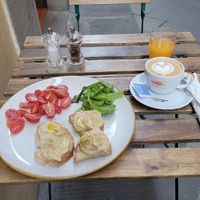Vegan breakfast - capuchino, OJ, and hummus toast at Ben Caffè in Florence