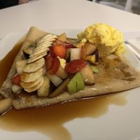 Vegan sweet crepe with fresh fruit maple syrup and mango sorbet   at Chocolat Cafe Creperie in Naxos