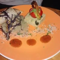 Samosas stuffed with chickpeas, pumpkin, zucchini, black salsify, dates and raisins, basil and fennel sauce, couscous with avocado and cucumber at Les Amants du Marche in Pau