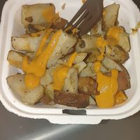 Cheese potatoes at Rooted: Eat More Plants in Medford