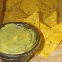 Chips and guac at Rooted: Eat More Plants in Medford