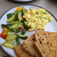 Scrambled tofu with vegetables and bread at KLYO - Alte Münze in Graz