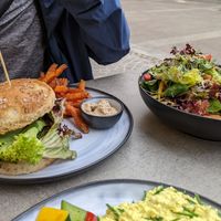 Vegan burger with sweet potato fries and the 'Alles Salat' at KLYO - Alte Münze in Graz