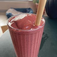 Cherry, cacao and date smoothie, hands down the bestie smoothie I've ever had ! Cute bamboo straw too !  #Veganuary at Nourish Plant Kitchen in Harrogate