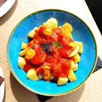 Patatas bravas with different sauces at Sidrería As de Guía in Llanes