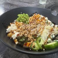 Poke bowl w brown rice, tofu, edamame, wasabi peas, jalapeños and other goodies  at Poke Jon's in Blue Ridge