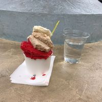 Malaga, coconut and raspberry flavored gelato, and a kindly poured glass of fresh mountain sourced water from the wonderful staff at Cattarissimo in Kotor