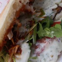 Vegap mit Saitan, veganer Joghurtsoße, schärfer Soße, frischem Salat, karamellisierten Zwiebeln und Rucola at Emirdağ-Kebabhaus in Aschaffenburg