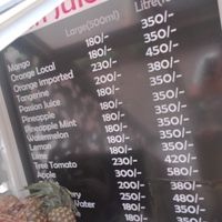 Wall menu at Okra Juice Bar in Nairobi