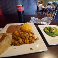 Papas a la Mexicana plate w/corn tortillas and avocado at Garely's Mexican Restaurant in Midland