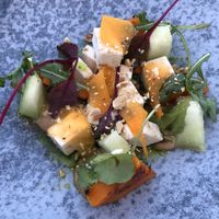Melon salad with vegan feta and carrots and grilled pumpkin   at Esan in Rhodes