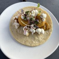 Corn taco! Corn fritter, corn jam and corn tortilla.  at Owamni by The Sioux Chef in Minneapolis