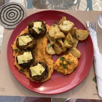 Filled portabelos with mashed sweet potatoes and potatoes in spices and vegan cheese on top. at The Kalymnos Experience Healthy Food Bar in Kalymnos