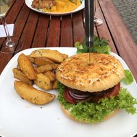 Vegan veggieburger and marinated tofu, with smashed carrot-potatoes and cherry tomato ragout. at Ratsstube in Ruedesheim Am Rhein