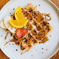 Frische Waffel mit Lotuscreme at Glückskind in Rostock