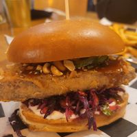 peanut red cabbage burger at KURA in Warsaw