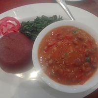 Stew with brown ugali and mboga at Bridges Organic Health Restaurant - Kaunda Str. in Nairobi