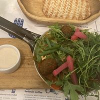 Shakshouka (comes w tahini and bread)  at Hamsa in Krakow