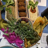 small mezze set with baba ghanoush, falafel and maghreb hummus  at Hamsa in Krakow