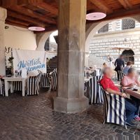 Covered seating at Zunfthaus zu Pfistern in Luzern