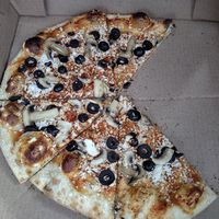 Expensive and a weak vegan cheese experience. at Paizano's Pizza in Baker City