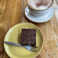 Brownie and cappuccino with soy milk at Esquires Coffee in Bournemouth