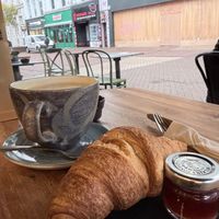 Croissant and coffeee  at Esquires Coffee in Bournemouth