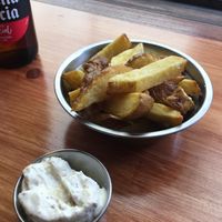 Homemade potatoes with alioli at Falafeleria - Lavapiés in Madrid