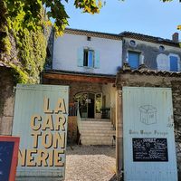 A sunny courtyard and a shady terrace - the best of both worlds.  at La Cartonnerie in Cleon Dandran
