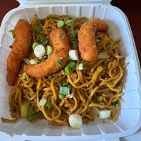 Cha cha garlic noodles (thick yellow noodles tossed with garlic and green onions in a butter soy sauce, topped with shrimp) at Loving Hut - Mira Mesa in San Diego